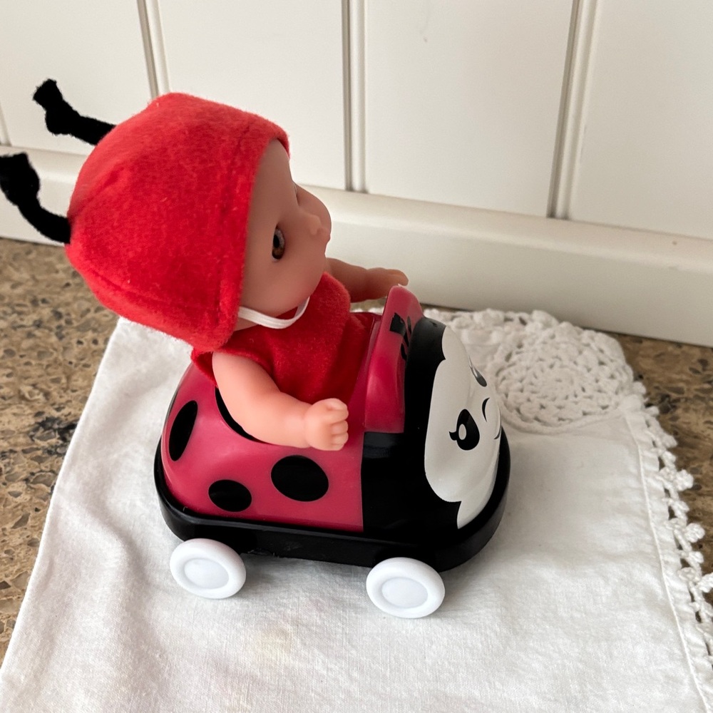 Lil’ Cutesies Red Ladybug Doll with Ride-On Buggie Car - Picture 3 of 12